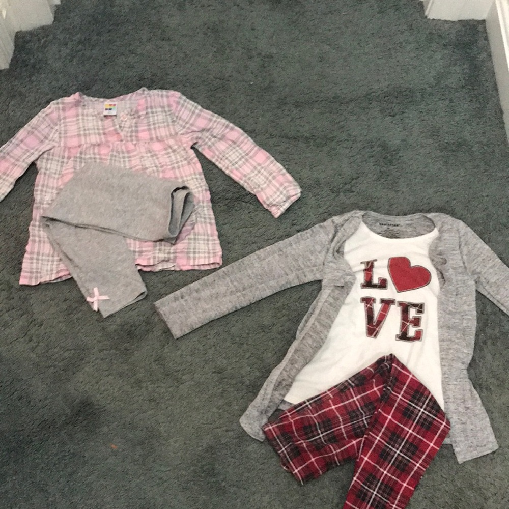 Two matching little girl outfits
